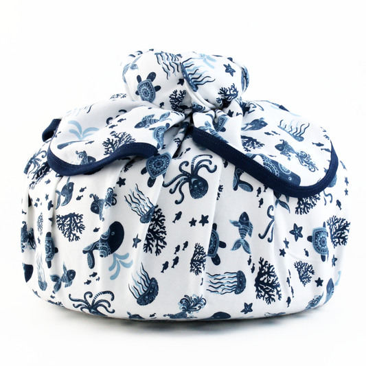 Wrapped with Endanzoo Organic Baby Swaddle Blanket - Deep Sea