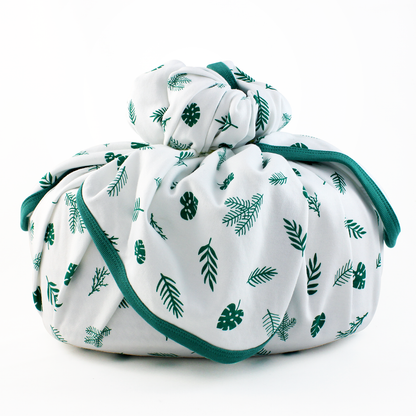 Wrapped with Endanzoo Organic Baby Swaddle Blanket - Tropical Leaves